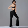 Detail of backless jumpsuit showing high-waist lifting effect and flared leg fit - Black