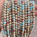 Macro shot of 8mm sea sediment jasper beads with blue and red marble textures - 4mm Approx 90 Pcs / Synthetic Sea Blue Snake Skin Jasper