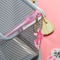 Pink translucent spray pen with a cute high heel pendant and silver bead chain - Glass Slipper Pink