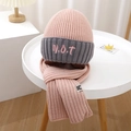 Detail of pink and grey ribbed knit kids hat and scarf set with V.O.T embroidery - Set / Pink