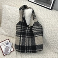 Detail of plush plaid tote bag showing soft sherpa texture and checkered pattern - Lamb Wool Large Checkered Style / Black & White Check