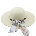 Detailed texture of straw sun hat with floral ribbon and elegant pearl embellishments - M(56-58cm) / Cream