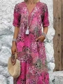Detail of V-neck bohemian print dress with side pockets and lightweight fabric texture - S / Rose Red
