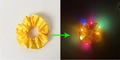 Yellow silk LED scrunchie showing daylight look and glowing effect in the dark - Lighted-Yellow