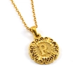 Detail of 18k gold plated round necklace pendant with letter R and hollow pattern - Letter R