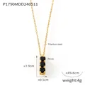 Collana in acciaio al titanio con triplo ciondolo in zircone nero e finitura oro - Oro Zirconia Nero