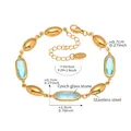 Detailed view of the lobster clasp and sky blue Czech glass stone on a golden chain - 16+5cm / Gold with Blue Stone