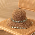 Brown hand-woven straw sun hat featuring delicate light blue and green crochet flowers - Blue Flower Khaki
