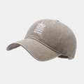 Close-up of vintage washed khaki baseball cap with religious cross and letter embroidery - Adjustable / Khaki