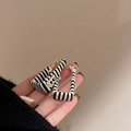 Detail of rectangular earring featuring black and white stripes with a gold-tone B initial - 6# 925 Sterling Silver Earring Post - Geometric B&W Stripes - Letter B