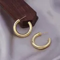 Orecchini a cerchio dorati a forma di C con finitura a specchio lucidata - E-047---Oro 25mm