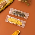 Transparent plastic packaging bags for long almond crisp wafers on dark background - Transparent / Pack of 100