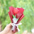 Detail of single red tulip bouquet with delicate white lace ribbon and green foliage - Red Tulip Red Korean Style