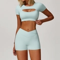 Two-piece light blue fitness set with hollow-out short sleeve top and V-neck gym shorts - S / Top And Bottom / Short Sleeve + Shorts / Cream Green