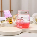 Pink Lucky Cat keychain with golden glitter sand liquid and a bubble handle strap - Lucky Cat with Strap (Pink)