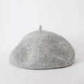 Close-up of light gray wool fabric texture and stitching on the minimalist beret hat - Adjustable / Light Gray