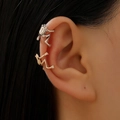 Gothic frog ear cuffs in silver and gold finish for non-pierced ears on a model - Gold Silver Mix (19)