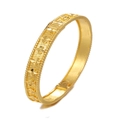 Detailed macro view of gold-plated bangle with embossed floral clover patterns and hinge - Style 6