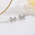 Boucles d'oreilles nœud papillon argenté avec zircons pour la création de bijoux - Style Argenté (ZYN-DME240606P)