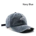 Vintage navy blue washed denim baseball cap with white wave embroidery and adjustable strap - Navy Blue