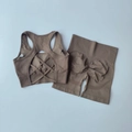 Coffee brown seamless yoga set featuring a racerback bra and high-waist scrunch shorts - S / Camel