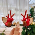 Close-up of Christmas antler hair clips with red berries, pine cones and mesh leaves - 28# Red Antler Pine Cone Pair