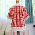 Detail of red and white checkered knit sweater for dogs on a wooden pet mannequin stand - Strawberry Wafer (Red Plaid)