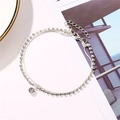Double-layered silver anklet with snake chain, sparkling rhinestones and a round pendant - Double Layer Round Pendant Style (7205)