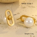 Detailed macro view showing a 2cm gold oval earring with a 1.2cm white pearl inlay - 18K Gold / Gold Back-Hanging Pearl Studs