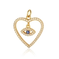 Dettaglio di ciondolo a cuore in oro con zirconi e design dell'occhio blu malvagio - Pavé Zirconi Cuore Malocchio