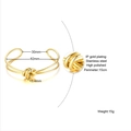 Polished 18K gold-plated stainless steel knotted C-shape cuff bangle with size markings - Thick Knot Style B-322