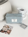Hellblaue Jeans-Achtecktasche mit weißem Schleifendruck für Kosmetik und Kopfhörer - Hellblau