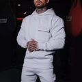 Men's light grey hooded tracksuit with tactical chest pocket in a gym setting - S / Light Gray
