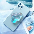 Close-up of a holographic bear phone grip with glitter on a light green smartphone - Expanding Stand / Iridescent Cloud