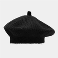 Detailed close-up of a black knitted beret hat showing soft mohair wool texture and top detail - One Size / Black