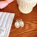 Mini transparent hair claw clip with two large white pearls on a rustic wood background - No. 24 Small Cherry 3.5cm