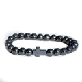 Dark gray metallic hematite beaded bracelet with a minimalist cross pendant accent - Hematite Cross