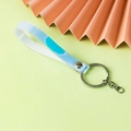 Iridescent laser PVC keychain strap with silver metal ring on decorative background - Holographic White with Chain