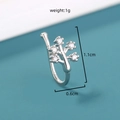Macro view of silver star ear stud with dimensions of 1.1cm by 0.6cm and 1g weight - Silver