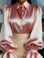 Dettaglio camicia in raso rosa con trama lucida e design con maniche a palloncino - Rosa