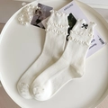 Calze bianche in cotone con bordi a volant e un delicato dettaglio a fiocco nero - Taglia unica / Bianco