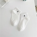 Detail of white cotton ankle sock with black crescent moon pattern on white desk - White - Moon
