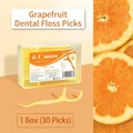 Grapefruit flavored dental floss sticks in a 30-piece box with yellow plastic design - 30 Pcs/Box Grapefruit Flavor