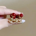 Détail de boucles d'oreilles en résine rouge avec breloques poney or et pierres zircon - 9# Pendentif Poney Or Boule Rouge