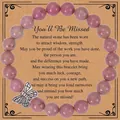 Bracciale in pietra zebra rosa 8mm con ciondolo a farfalla su carta regalo - Bracciale di Rodocrosite