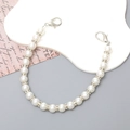 Elegant white pearl strap with sparkling silver rhinestone spacers and metal lobster clasps - 22 Pearls Rhinestone Ring Hand Chain (Silver)