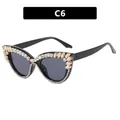 Lunettes de soleil œil de chat pour femmes avec monture noire et bords sertis de cristaux - Zircone Champagne