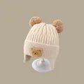 Winter knit baby earflap hat in creamy white with bear patch and faux fur pom-poms - Teddy Bear Double Ball Beige (2 Months - 2 Years Old)