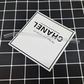 Single transparent curved borosilicate glass straw displayed on a minimalist background - 8*200mm / Clear Bent