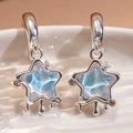 Chic silver star earrings with iridescent opal center and sparkling zircon accents - Blue Star